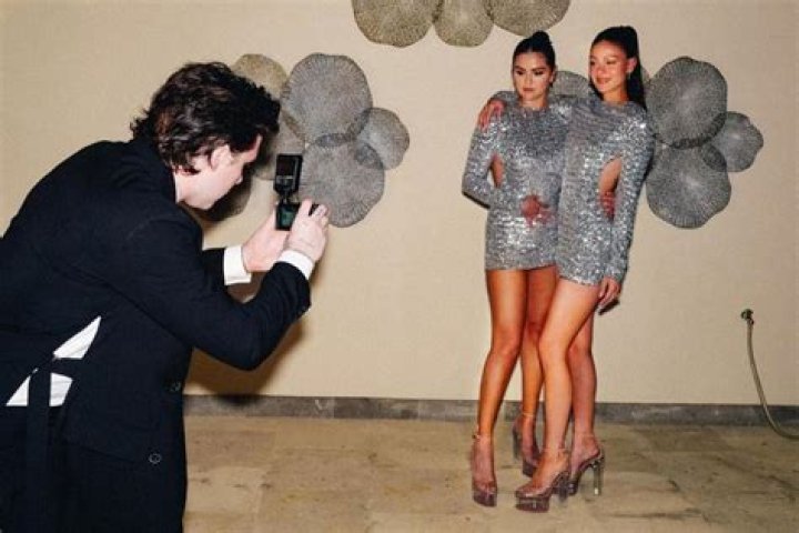 
Selena Gomez and Nicola Peltz Twin in Sequin Valentino Minis for NYE and Reveal Matching Tattoos 