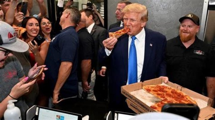 
Watch: Donald Trump eats pizza slice, says ‘Does anybody want a piece that I’ve eaten?’ at Florida joint 